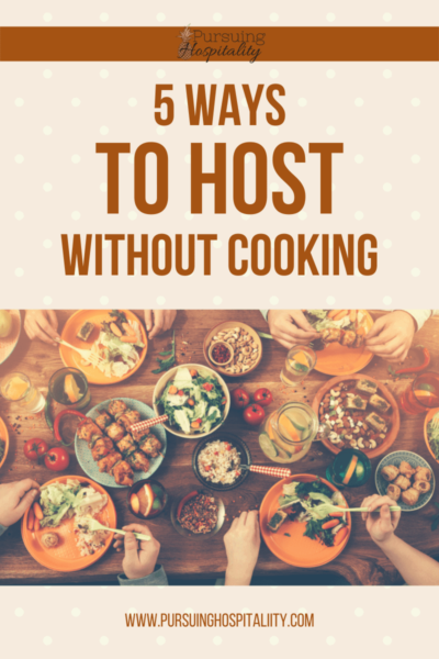 5 Ways to host without cooking dinner table with guest sitting at it.